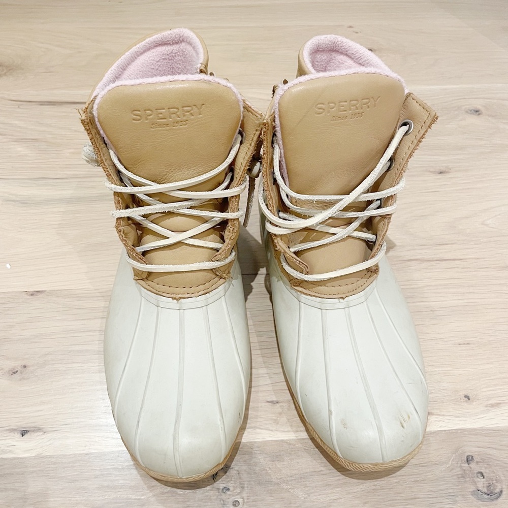 Sperry rain boots. Comfy pink inside. Worn a few times.